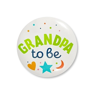 Detailed close-up of Grandpa to be tinplate badge for baby shower gender reveal party