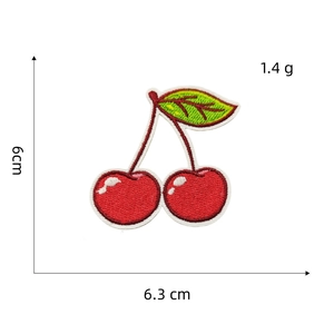 Detail showing red cherry embroidered patch with precise measurements 6cm x 6.3cm