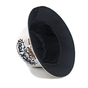 Canvas bucket hat featuring a white exterior with duck print and black interior lining