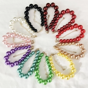 Top view of multi-color pearl necklaces set in 12 vibrant shades with lobster clasps