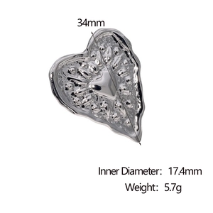 Technical drawing of a silver heart ring showing 17.4mm inner diameter and 5.7g weight