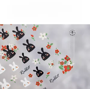 Detail shot of 5D thin nail stickers featuring rabbit heads and floral patterns