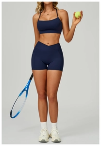 Deep blue high-waisted crossover yoga shorts with side pocket for outdoor athletic training