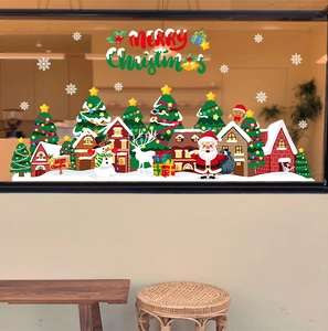 Detailed Christmas window stickers featuring Santa, reindeer, and snowy village scene