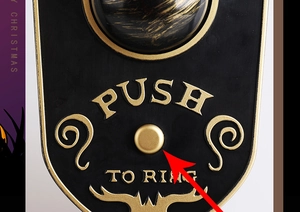 Gros plan du bouton de sonnette Halloween vintage avec bordure dorée et texte Push