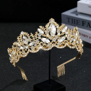 Luxurious gold crystal bridal tiara featuring sparkling rhinestones and secure hair combs