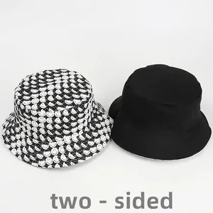 Chapeau bob réversible en toile avec imprimé smiley et face noire unie classique