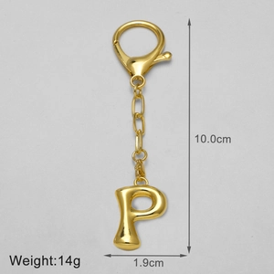 Detail view of 18k gold plated letter P keychain with dimensions 10cm length and 14g weight