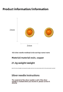 Detail view of vintage resin earrings with gold copper frame and 925 silver needles