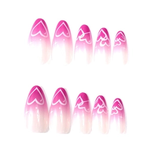 Pink and white gradient almond fake nails with heart patterns and sparkle details