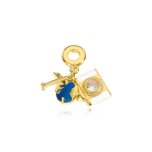 Macro shot of gold travel charms including airplane, globe and passport for bracelet