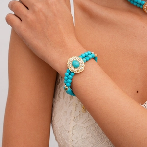 Bohemian double-strand turquoise beaded bracelet with crystal flower centerpiece