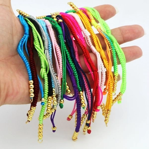 Handmade braided rope bracelets in multiple colors with polished gold beads