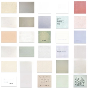 Macro view of 30 vintage typewriter quote stickers in muted Morandi tones for DIY