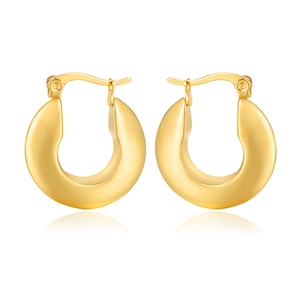 Polished golden chunky hoop earrings with geometric C-shape and elegant mirror reflection