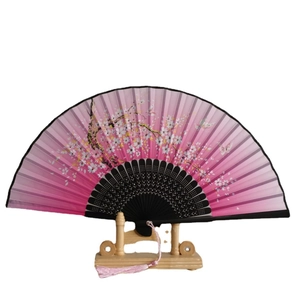 Pink gradient folding fan with cherry blossom pattern and butterfly on wooden stand