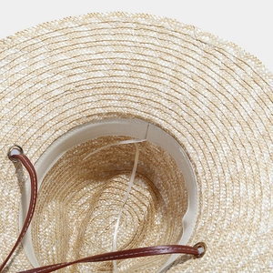 Straw sun hat with wide brim, natural weaving texture and brown leather cord detail