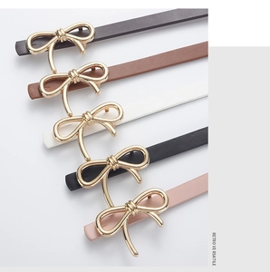 Detail showing five PU leather belts with golden bow buckles in various elegant colors