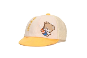 Detail of baby mesh cap showing cute bear embroidery and breathable yellow fabric
