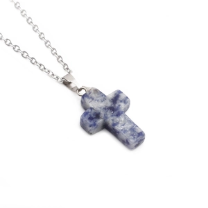 Minimalist stainless steel necklace with blue natural stone cross pendant on white background