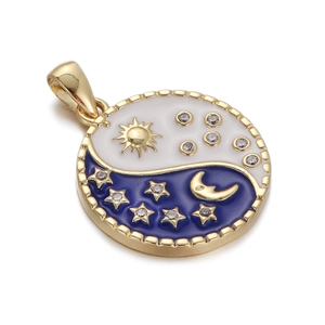 Macro shot of gold compass pendant with sun moon enamel and zircon inlay details