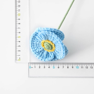 Handmade crochet blue poppy flower with yellow center and green stem, 5.5cm diameter size