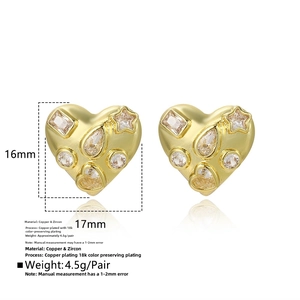 Detail of 18k gold plated heart earrings featuring inlaid cubic zirconia stones