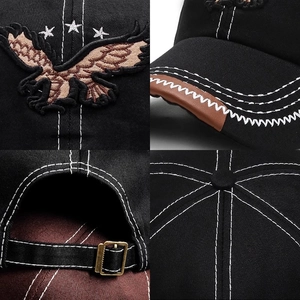 Black cotton baseball cap with eagle embroidery, contrast stitching and metal buckle