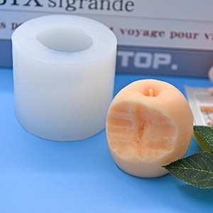 Apple-shaped silicone mold for DIY baking and candle making with realistic bitten fruit design