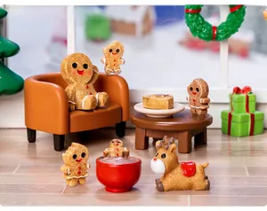 Miniature Christmas gingerbread man figurines and micro landscape holiday decor set