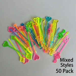 Close-up of 50 mixed colorful plastic fruit picks in heart and music note shapes