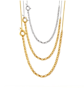 Detail of the two-tone gold and silver stainless steel necklace with toggle OT clasp