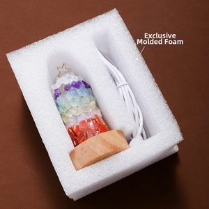 Detail view of the colorful raw crystal lamp in protective shockproof foam packaging