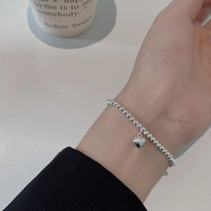 Elegante 925 sterling zilveren kralenarmband met klassieke hartjes hanger voor dames