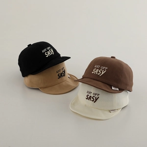 Close-up of baby short brim baseball caps with SASY letter embroidery in four soft colors