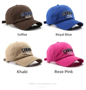 Detail of embroidered vintage baseball caps in four colors with washed cotton texture