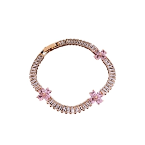 Rose gold flower bracelet with pink heart stones and rectangular cubic zirconia accents