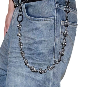 Silver skull jeans chain for punk hip hop style hanging on blue denim trousers