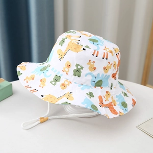 Detail of children's cotton sun hat with cartoon animal prints and adjustable windproof cord