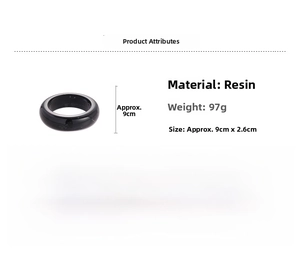 Macro view of geometric black resin bangle showing 97g weight and 9cm x 2.6cm dimensions