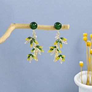 Elegant bamboo leaf drop earrings with green enamel and crystals in retro Chinese style