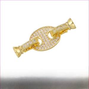 Detailed view of 18K gold plated brass jewelry clasp with zircons measuring 13.5x36.5mm