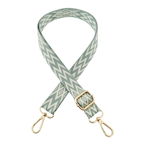 Adjustable geometric embroidered bag strap with gold hooks in light green and beige