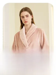 Detail of pink flannel bathrobe with mink velvet collar and warm thickened texture