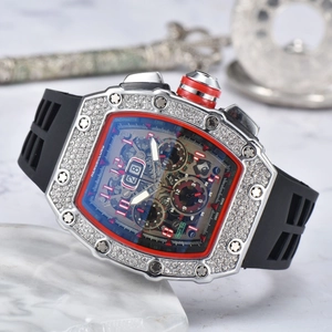 Detail view of the diamond-set tonneau bezel and skeletonized dial on this sport watch