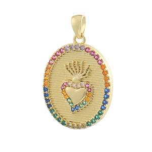 Detailed view of a gold oval pendant with a central heart and colorful gemstones