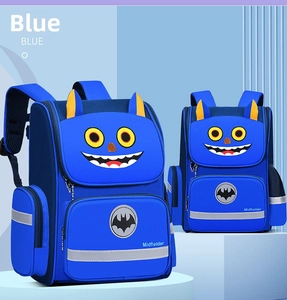 Detail of blue cartoon monster schoolbag with bat logo and reflective safety strips