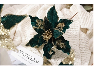Detail of 30cm dark green velvet Christmas poinsettia with gold glitter edges and center