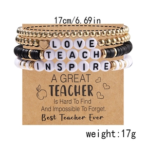 Detailed view of teacher appreciation bracelets with colorful beads and inspirational text