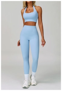 Detail of high waist light blue yoga pants with moisture-wicking and breathable fabric